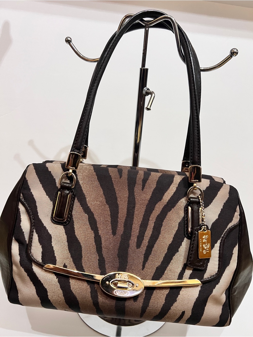 Coach Zebra-Print Satchel in Brown, Black and Cream with Gold Hardware.